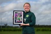 19 September 2023; Ireland Women’s National Team player Amber Barrett with their commemorative collage by SSE Airtricity at the FAI National Training Centre in Abbotstown, Dublin. Photo by Stephen McCarthy/Sportsfile