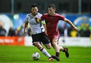 15 September 2023; Ed McCarthy of Galway United and Patrick Hoban of Dundalk during the Sports Direct Men’s FAI Cup quarter-final match between Galway United and Dundalk at Eamonn Deacy Park in Galway. Photo by Ben McShane/Sportsfile