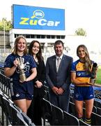 20 September 2023; Dublin goalkeeper Abby Shiels with her 2023 ZuCar Golden Glove Award and Clare star Fidelma Marrinan with the 2023 ZuCar Golden Boot Award with Allyson McCarthy, Group Marketing Manager, Joe Duffy Group, representing ZuCar, and LGFA President Mícheál Naughton at Croke Park in Dublin. Photo by Piaras Ó Mídheach/Sportsfile