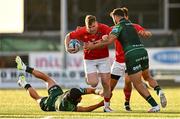 22 September 2023; Rory Scannell of Munster is tackled by Byron Ralston, left, and Shayne Bolton of Connacht during the pre season friendly match between Connacht and Munster at The Sportsground in Galway. Photo by Ben McShane/Sportsfile