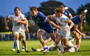 22 September 2023; Ben Brownlee of Leinster breaks away from Mike Lowry of Ulster, right, on his way to scoring his side's third try during the pre season friendly match between Leinster and Ulster at Navan RFC in Navan, Meath. Photo by Sam Barnes/Sportsfile