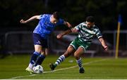 22 September 2023; Jake Doyle of UCD in action against Roberto Lopes of Shamrock Rovers during the SSE Airtricity Men's Premier Division match between UCD and Shamrock Rovers at UCD Bowl in Dublin. Photo by Stephen McCarthy/Sportsfile