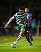 22 September 2023; Neil Farrugia of Shamrock Rovers in action against Sean Brennan of UCD during the SSE Airtricity Men's Premier Division match between UCD and Shamrock Rovers at UCD Bowl in Dublin. Photo by Stephen McCarthy/Sportsfile