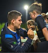22 September 2023; Ben Brownlee of Leinster signs an autograph for a young supporter after the pre season friendly match between Leinster and Ulster at Navan RFC in Navan, Meath. Photo by Sam Barnes/Sportsfile