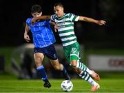 22 September 2023; Graham Burke of Shamrock Rovers in action against Brendan Barr of UCD during the SSE Airtricity Men's Premier Division match between UCD and Shamrock Rovers at UCD Bowl in Dublin. Photo by Stephen McCarthy/Sportsfile
