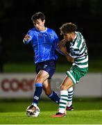 22 September 2023; Danú Bishop Kinsella of UCD in action against Naj Razi of Shamrock Rovers during the SSE Airtricity Men's Premier Division match between UCD and Shamrock Rovers at UCD Bowl in Dublin. Photo by Stephen McCarthy/Sportsfile