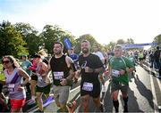 23 September 2023; Runners, from left, Andrew Tyndall, from Dublin, Paul Syder, from Kildare, and Darren Hayden, from Offaly pictured at the 2023 Irish Life Dublin Half Marathon which took place on Saturday 23rd of September at Phoenix Park in Dublin. Photo by David Fitzgerald/Sportsfile