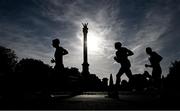 23 September 2023; The lead pack pass the Phoenix Monument during the 2023 Irish Life Dublin Half Marathon which took place on Saturday 23rd of September at Phoenix Park in Dublin. Photo by David Fitzgerald/Sportsfile