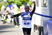 23 September 2023; Peter Somba, Dunboyne AC, Meath crosses the line to win the 2023 Irish Life Dublin Half Marathon which took place on Saturday 23rd of September at Phoenix Park in Dublin. Photo by David Fitzgerald/Sportsfile