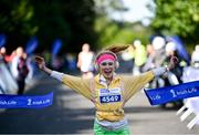 23 September 2023; Aoife Cleary, from Wicklow, crosses the line to win the women's category during the 2023 Irish Life Dublin Half Marathon which took place on Saturday 23rd of September at Phoenix Park in Dublin. Photo by David Fitzgerald/Sportsfile