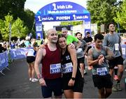 23 September 2023; Mark Darby, from Louth, and Nicole Donnelly, from Armagh, after finishing the 2023 Irish Life Dublin Half Marathon which took place on Saturday 23rd of September at Phoenix Park in Dublin. Photo by David Fitzgerald/Sportsfile