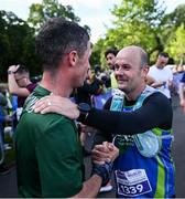 23 September 2023; Mark Newton, left, and Jason Newton, from Kildare, after finishing the 2023 Irish Life Dublin Half Marathon which took place on Saturday 23rd of September at Phoenix Park in Dublin. Photo by David Fitzgerald/Sportsfile