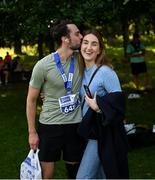 23 September 2023; Diarmuid O'Leary, from Kildare, kisses his girlfriend Kelly Fisher after the 2023 Irish Life Dublin Half Marathon which took place on Saturday 23rd of September at Phoenix Park in Dublin. Photo by David Fitzgerald/Sportsfile