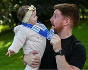 23 September 2023; Shane Rice with his daughter Billie, aged 9 months, after the 2023 Irish Life Dublin Half Marathon which took place on Saturday 23rd of September at Phoenix Park in Dublin. Photo by David Fitzgerald/Sportsfile
