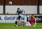 22 September 2023; Daryl Horgan of Dundalk is tackled by Jamie Lennon of St Patrick's Athletic during the SSE Airtricity Men's Premier Division match between St Patrick's Athletic and Dundalk at Richmond Park in Dublin. Photo by Seb Daly/Sportsfile