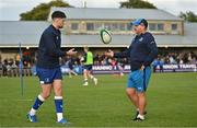 22 September 2023; Leinster kicking coach and lead performance analyst Emmet Farrell, right, and Harry Byrne of Leinster before the pre season friendly match between Leinster and Ulster at Navan RFC in Navan, Meath. Photo by Sam Barnes/Sportsfile