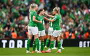 23 September 2023; Louise Quinn of Republic of Ireland, left, Tyler Toland, centre, and Lily Agg celebrate after their side's victory in the UEFA Women's Nations League B1 match between Republic of Ireland and Northern Ireland at Aviva Stadium in Dublin. Photo by Ben McShane/Sportsfile