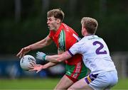 23 September 2023; Cameron McCormack of Ballymun Kickhams in action against James Murphy of Kilmacud Crokes during the Dublin Senior Football Championship quarter-final match between Kilmacud Crokes and Ballymun Kickhams at Parnell Park in Dublin. Photo by Piaras Ó Mídheach/Sportsfile