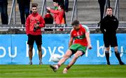 23 September 2023; James McCarthy of Ballymun Kickhams, acting as water carrier, watches team-mate Dean Rock take a free-kick during the Dublin Senior Football Championship quarter-final match between Kilmacud Crokes and Ballymun Kickhams at Parnell Park in Dublin. Photo by Piaras Ó Mídheach/Sportsfile