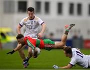 23 September 2023; Dillon Keating of Ballymun Kickhams in action against Hugh Kenny of Kilmacud Crokes during the Dublin Senior Football Championship quarter-final match between Kilmacud Crokes and Ballymun Kickhams at Parnell Park in Dublin. Photo by John Sheridan/Sportsfile