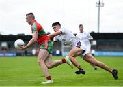 23 September 2023; Paddy Small of Ballymun Kickhams in action against Theo Clancy of Kilmacud Crokes during the Dublin Senior Football Championship quarter-final match between Kilmacud Crokes and Ballymun Kickhams at Parnell Park in Dublin. Photo by John Sheridan/Sportsfile