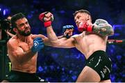 23 September 2023; Brian Moore, right, in action against Otto Rodrigues  in their Featherweight bout during the Bellator 299 at 3 Arena in Dublin. Photo by David Fitzgerald/Sportsfile