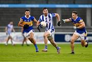 23 September 2023; Michael Darragh MacAuley of Ballyboden St Enda's in action against Eoin O'Brien, right, and Kevin Stephenson of Castleknock during the Dublin Senior Football Championship quarter-final match between Ballyboden St Enda's and Castleknock at Parnell Park in Dublin. Photo by Piaras Ó Mídheach/Sportsfile