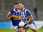 23 September 2023; Luke O'Donoghue of Ballyboden St Enda's in action against Kevin Stephenson of Castleknock during the Dublin Senior Football Championship quarter-final match between Ballyboden St Enda's and Castleknock at Parnell Park in Dublin. Photo by Piaras Ó Mídheach/Sportsfile