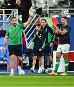 23 September 2023; Jack Conan of Ireland is applauded by team-mate Stuart McCloskey as he walks onto the pitch before the 2023 Rugby World Cup Pool B match between South Africa and Ireland at Stade de France in Paris, France. Photo by Harry Murphy/Sportsfile
