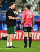 23 September 2023; South Africa director of rugby Rassie Erasmus talks to assistant referee Mathieu Raynal before the 2023 Rugby World Cup Pool B match between South Africa and Ireland at Stade de France in Paris, France. Photo by Harry Murphy/Sportsfile