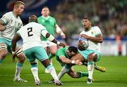 23 September 2023; Damian Willemse of South Africa evades the tackle of Hugo Keenan of Ireland during the 2023 Rugby World Cup Pool B match between South Africa and Ireland at Stade de France in Paris, France. Photo by Harry Murphy/Sportsfile