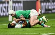 23 September 2023; Cheslin Kolbe of South Africa is tackled by Mack Hansen of Ireland during the 2023 Rugby World Cup Pool B match between South Africa and Ireland at Stade de France in Paris, France. Photo by Harry Murphy/Sportsfile
