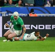 23 September 2023; Mack Hansen of Ireland scores the first try of the game in the 33rd minute during the 2023 Rugby World Cup Pool B match between South Africa and Ireland at Stade de France in Paris, France. Photo by Brendan Moran/Sportsfile