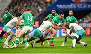 23 September 2023; James Lowe of Ireland is tackled by Damian de Allende of South Africa, left, and Bongi Mbonambi during the 2023 Rugby World Cup Pool B match between South Africa and Ireland at Stade de France in Paris, France. Photo by Ramsey Cardy/Sportsfile