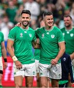 23 September 2023; Conor Murray of Ireland, left, and Jonathan Sexton celebrate after their side's victory in the 2023 Rugby World Cup Pool B match between South Africa and Ireland at Stade de France in Paris, France. Photo by Ramsey Cardy/Sportsfile