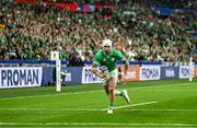 23 September 2023; Mack Hansen of Ireland on his way to scoring his side's first try during the 2023 Rugby World Cup Pool B match between South Africa and Ireland at Stade de France in Paris, France. Photo by Harry Murphy/Sportsfile