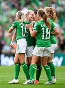 23 September 2023; Lily Agg of Republic of Ireland celebrates after scoring her side's third goal with team-mates, including Denise O'Sullivan, 10, and Kyra Carusa, 18, during the UEFA Women's Nations League B1 match between Republic of Ireland and Northern Ireland at Aviva Stadium in Dublin. Photo by Stephen McCarthy/Sportsfile