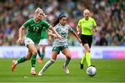 23 September 2023; Lily Agg of Republic of Ireland in action against Joely Andrews of Northern Ireland during the UEFA Women's Nations League B1 match between Republic of Ireland and Northern Ireland at Aviva Stadium in Dublin. Photo by Stephen McCarthy/Sportsfile