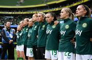 23 September 2023; Republic of Ireland players, from left, Emily Whelan, Claire O'Riordan, Saoirse Noonan, Lily Agg, Hayley Nolan, Savannah McCarthy, Abbie Larkin, Izzy Atkinson and Jamie Finn stand for the playing of the National Anthem before the UEFA Women's Nations League B1 match between Republic of Ireland and Northern Ireland at Aviva Stadium in Dublin. Photo by Stephen McCarthy/Sportsfile