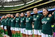 23 September 2023; Republic of Ireland players, from left, Emily Whelan, Claire O'Riordan, Saoirse Noonan, Lily Agg, Haley Nolan, Savannah McCarthy, Abbie Larkin, Izzy Atkinson, Jamie Finn, Chloe Mustaki, Éabha O'Mahony and Marissa Sheva stand for the playing of the National Anthem before the UEFA Women's Nations League B1 match between Republic of Ireland and Northern Ireland at Aviva Stadium in Dublin. Photo by Stephen McCarthy/Sportsfile