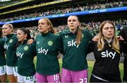 23 September 2023; Republic of Ireland players, from left, Éabha O'Mahony, Marissa Sheva, Grace Moloney, Megan Walsh and equipment manager Orla Haran stand for the playing of the National Anthem before the UEFA Women's Nations League B1 match between Republic of Ireland and Northern Ireland at Aviva Stadium in Dublin. Photo by Stephen McCarthy/Sportsfile