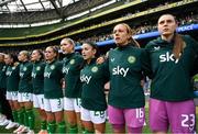 23 September 2023; Republic of Ireland players, from left, Abbie Larkin, Izzy Atkinson, Jamie Finn, Chloe Mustaki, Éabha O'Mahony, Marissa Sheva, Grace Moloney and Megan Walsh stand for the playing of the National Anthem before the UEFA Women's Nations League B1 match between Republic of Ireland and Northern Ireland at Aviva Stadium in Dublin. Photo by Stephen McCarthy/Sportsfile