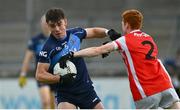 24 September 2023; Cormac McCartan of St Judes in action against Michael Conroy of Cuala during the Dublin Senior Football Championship quarter-final match between St Judes and Cuala at Parnell Park in Dublin. Photo by Tyler Miller/Sportsfile