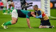 23 September 2023; Rónan Kelleher of Ireland with Ireland team chartered physiotherapist Keith Fox before the 2023 Rugby World Cup Pool B match between South Africa and Ireland at Stade de France in Paris, France. Photo by Brendan Moran/Sportsfile