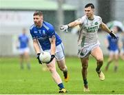 24 September 2023; Aaron Hensey of Tullamore in action against Jack Clancy of Ferbane during the Offaly County Senior Football Championship final match between Ferbane and Tullamore at Glenisk O'Connor Park in Tullamore, Offaly. Photo by Eóin Noonan/Sportsfile