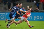 24 September 2023; Niall O'Callaghan of Cuala is tackled by Daragh Kavanagh of St Judes during the Dublin Senior Football Championship quarter-final match between St Judes and Cuala at Parnell Park in Dublin. Photo by Tyler Miller/Sportsfile