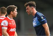 24 September 2023; Daragh Kavanagh of St Judes and Luke Keating of Cuala tussle during the Dublin Senior Football Championship quarter-final match between St Judes and Cuala at Parnell Park in Dublin. Photo by Tyler Miller/Sportsfile