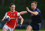 24 September 2023; Eoin Kennedy of Cuala in action against Tom Lahiff of St Judes during the Dublin Senior Football Championship quarter-final match between St Judes and Cuala at Parnell Park in Dublin. Photo by Tyler Miller/Sportsfile