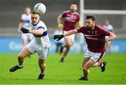 24 September 2023; Michael O'Rowe of St Vincents in action against Glen McNamara of Raheny during the Dublin Senior Football Championship quarter-final match between Raheny and St Vincents at Parnell Park in Dublin. Photo by Tyler Miller/Sportsfile
