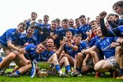 24 September 2023; Tullamore players celebrate with the cup after the Offaly County Senior Football Championship final match between Ferbane and Tullamore at Glenisk O'Connor Park in Tullamore, Offaly. Photo by Eóin Noonan/Sportsfile